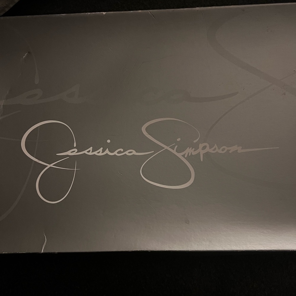 Jessica Simpson- high heel boots